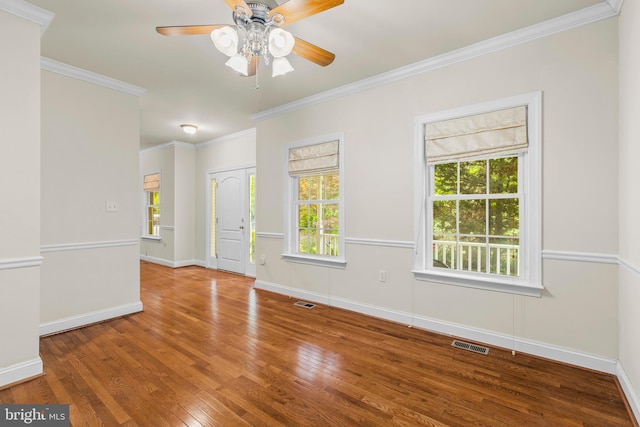 22 Berry Ln, Harpers Ferry, WV 25425 - unfurnished room with plenty of natural light, wood finished floors, a ceiling fan, crown molding, and baseboards