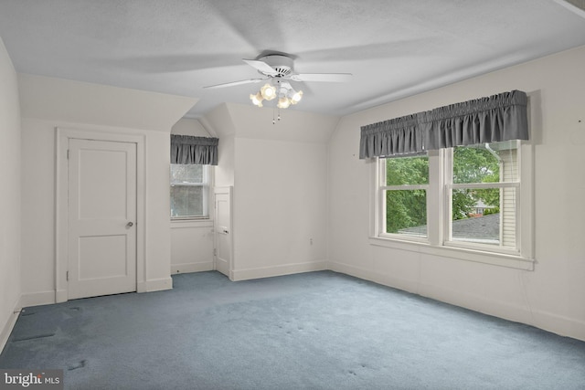 15 E Grant St, Woodstown, NJ 08098 - spare room with carpet, vaulted ceiling, ceiling fan, and baseboards