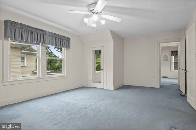 15 E Grant St, Woodstown, NJ 08098 - empty room with carpet floors, baseboards, and ceiling fan