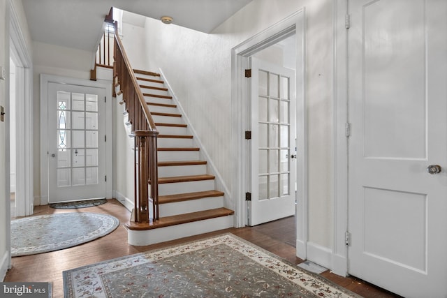 15 E Grant St, Woodstown, NJ 08098 - foyer entrance with wood finished floors, stairs, and baseboards