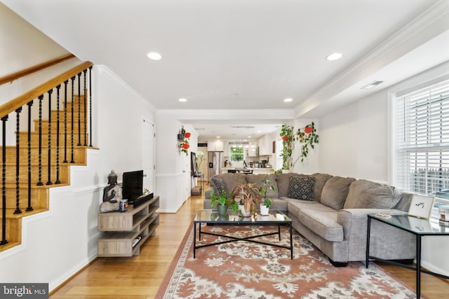 5310 B St SE, Washington, DC 20019 - living area with light wood-type flooring, ornamental molding, recessed lighting, and stairway