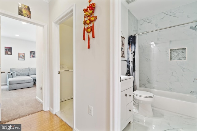 5310 B St SE, Washington, DC 20019 - bathroom featuring vanity, shower / tub combo, and toilet