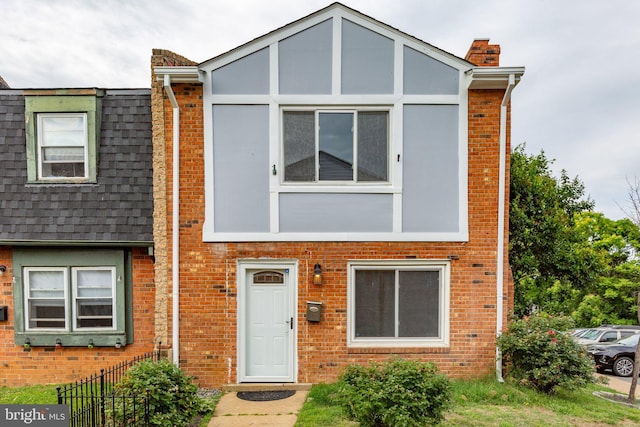 231 Ivanhoe Ct, Fredericksburg, VA 22401 - townhome / multi-family property featuring brick siding and a chimney