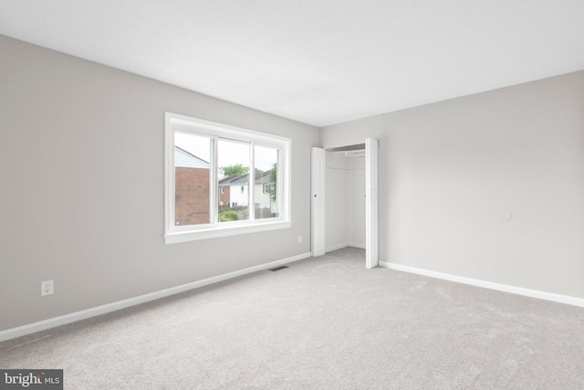 231 Ivanhoe Ct, Fredericksburg, VA 22401 - unfurnished bedroom with carpet flooring, baseboards, and a closet