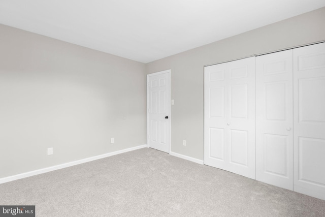 231 Ivanhoe Ct, Fredericksburg, VA 22401 - unfurnished bedroom featuring carpet flooring, baseboards, and a closet