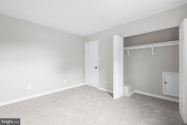 231 Ivanhoe Ct, Fredericksburg, VA 22401 - unfurnished bedroom featuring carpet, a closet, and baseboards
