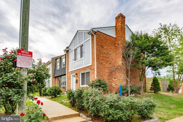 231 Ivanhoe Ct, Fredericksburg, VA 22401 - view of front of house with brick siding and a chimney