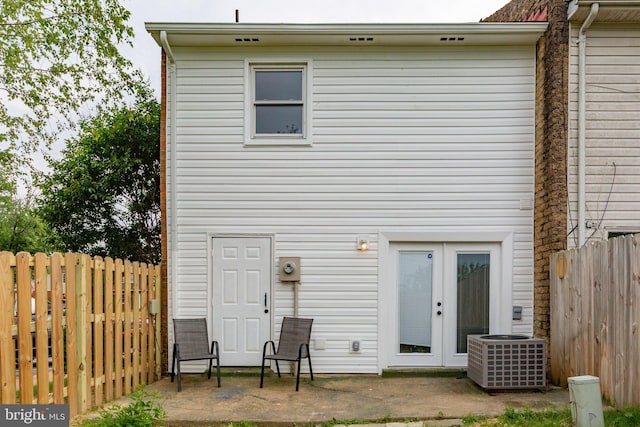 231 Ivanhoe Ct, Fredericksburg, VA 22401 - rear view of property with a patio, a fenced backyard, french doors, and central air condition unit