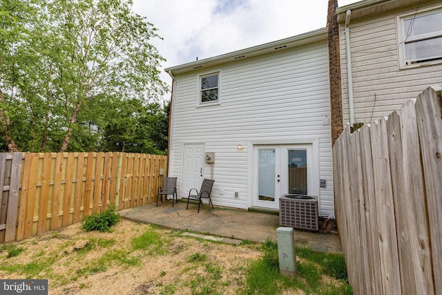231 Ivanhoe Ct, Fredericksburg, VA 22401 - back of property featuring a patio, cooling unit, a fenced backyard, and french doors