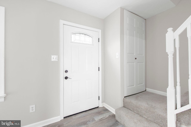 231 Ivanhoe Ct, Fredericksburg, VA 22401 - entrance foyer with stairs, wood finished floors, and baseboards