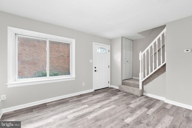 231 Ivanhoe Ct, Fredericksburg, VA 22401 - foyer featuring stairs, wood finished floors, and baseboards