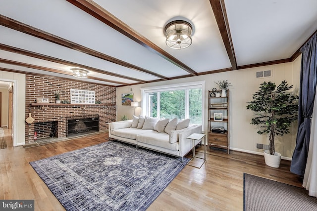 7007 Clifton Rd, Clifton, VA 20124 - living room with beamed ceiling, light wood-style floors, and a fireplace