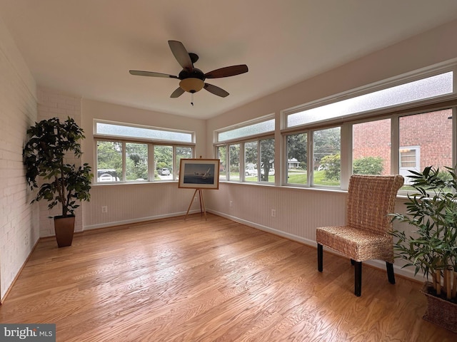 5420 Eastbourne Dr, Springfield, VA 22151 - unfurnished room with light wood-style flooring, a ceiling fan, baseboards, and a wainscoted wall