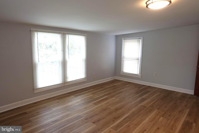 413 Dominion Rd, Chester, MD 21619 - unfurnished room with plenty of natural light, wood finished floors, and baseboards