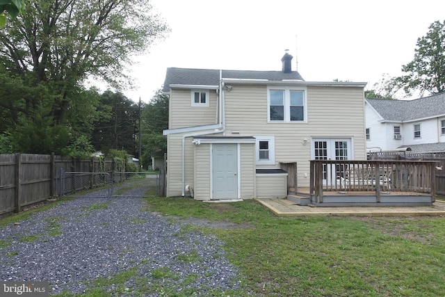 413 Dominion Rd, Chester, MD 21619 - rear view of house featuring a wooden deck, a gate, a chimney, and french doors