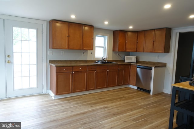 413 Dominion Rd, Chester, MD 21619 - kitchen with dishwasher, white microwave, a sink, brown cabinetry, and recessed lighting