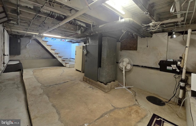 336 Bar Harbor Rd, Pasadena, MD 21122 - unfinished basement with stairs, electric panel, and heating unit