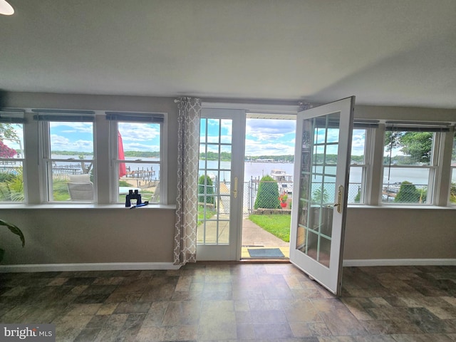 336 Bar Harbor Rd, Pasadena, MD 21122 - entryway with a water view, baseboards, and stone finish flooring