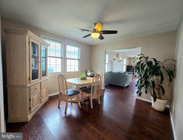 336 Bar Harbor Rd, Pasadena, MD 21122 - dining space with baseboards, a ceiling fan, and dark wood finished floors