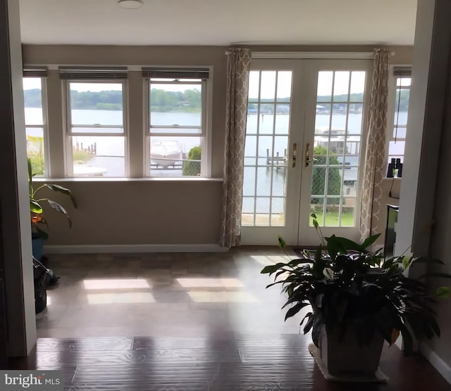 336 Bar Harbor Rd, Pasadena, MD 21122 - entryway with a water view, baseboards, and french doors