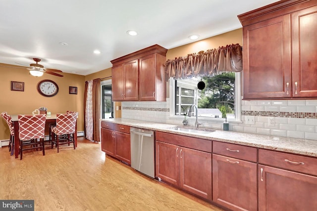 199 Applegate, Hamilton, NJ 08690 - kitchen with stainless steel dishwasher, a sink, a ceiling fan, backsplash, and light wood-style floors