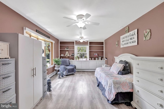 199 Applegate, Hamilton, NJ 08690 - bedroom with light wood finished floors, a baseboard heating unit, and a ceiling fan