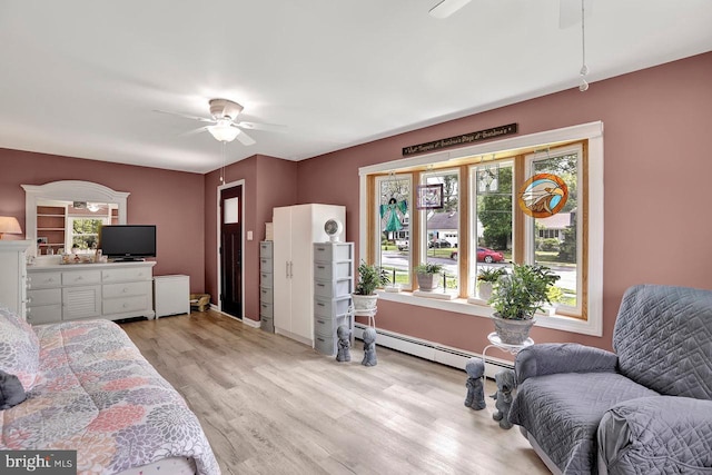 199 Applegate, Hamilton, NJ 08690 - bedroom featuring baseboard heating, light wood-style floors, and ceiling fan