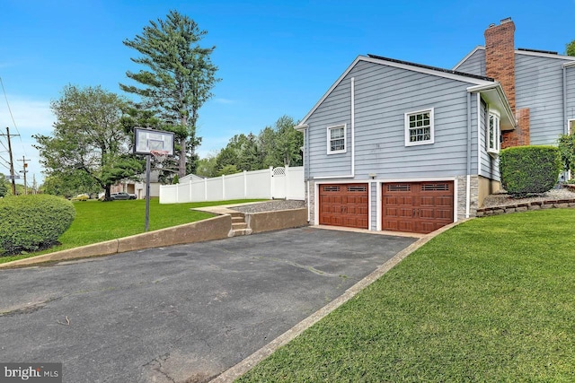 199 Applegate, Hamilton, NJ 08690 - view of home's exterior featuring asphalt driveway and an attached garage