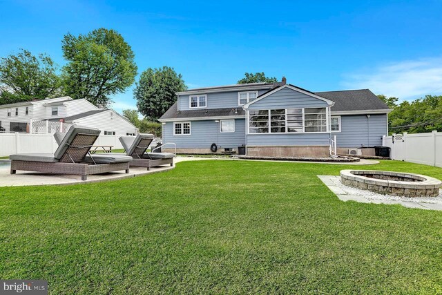199 Applegate, Hamilton, NJ 08690 - rear view of property featuring a fire pit and a patio
