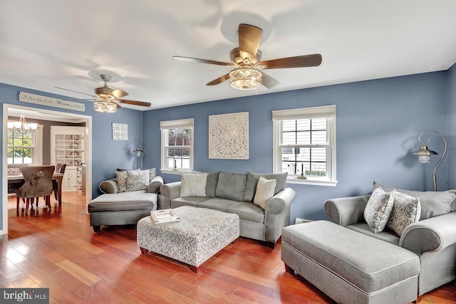 199 Applegate, Hamilton, NJ 08690 - living area with ceiling fan, wood finished floors, and a chandelier
