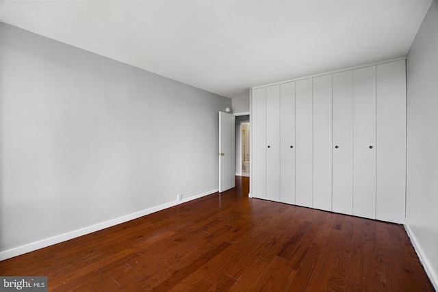 220 Locust St Unit 7As, Philadelphia, PA 19106 - unfurnished bedroom with wood finished floors and a closet