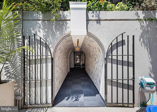 220 Locust St Unit 7As, Philadelphia, PA 19106 - property entrance featuring stucco siding and a gate