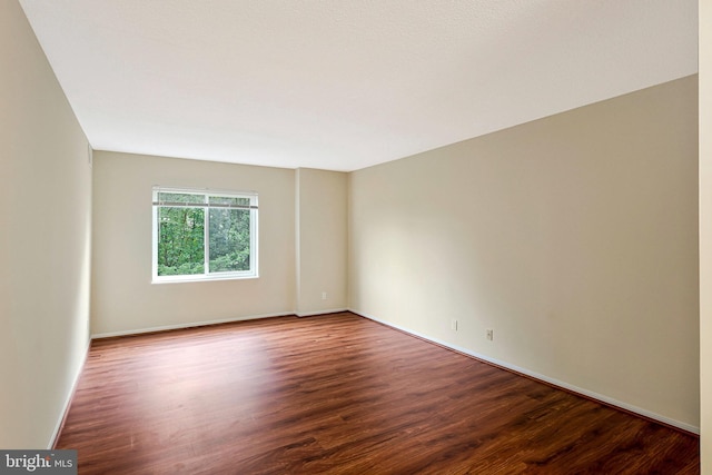 8370 Greensboro Dr Unit 508, Mclean, VA 22102 - unfurnished room featuring wood finished floors and baseboards