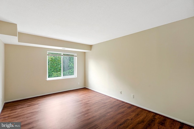 8370 Greensboro Dr Unit 508, Mclean, VA 22102 - empty room with wood finished floors and baseboards