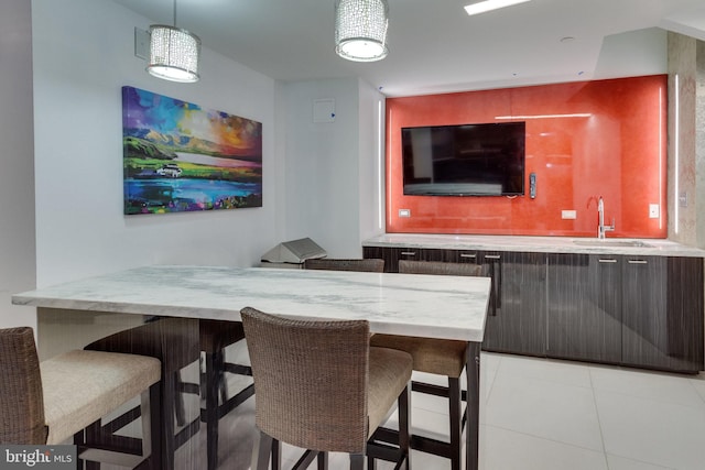 8370 Greensboro Dr Unit 508, Mclean, VA 22102 - indoor wet bar with hanging light fixtures and light tile patterned floors