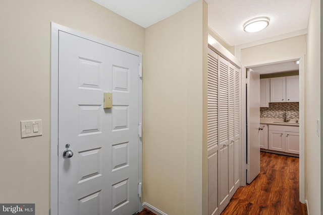 8370 Greensboro Dr Unit 508, Mclean, VA 22102 - hallway with a sink and dark wood finished floors