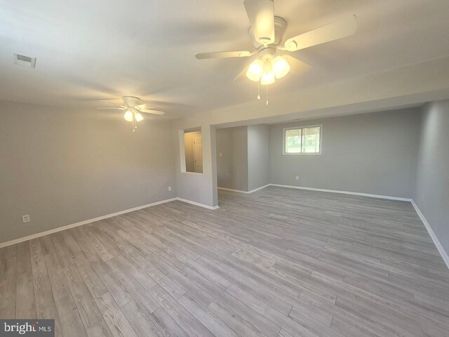 11 Centennial Ct, Sicklerville, NJ 08081 - spare room featuring a ceiling fan, baseboards, and wood finished floors