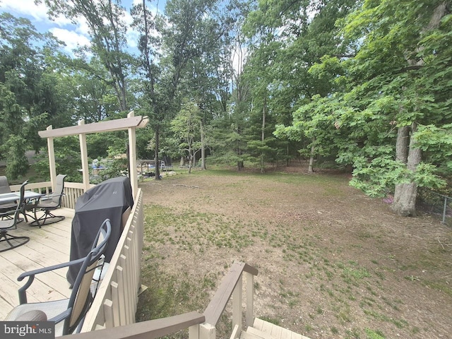 11 Centennial Ct, Sicklerville, NJ 08081 - view of yard with outdoor dining area, a wooden deck, and view of scattered trees