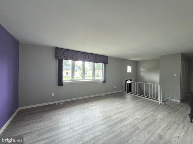 11 Centennial Ct, Sicklerville, NJ 08081 - unfurnished living room with wood finished floors and baseboards