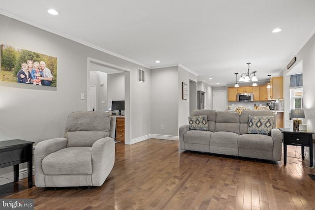545 Lawrence Corner Rd, Pittsgrove, NJ 08318 - living area featuring dark wood finished floors, a chandelier, recessed lighting, ornamental molding, and baseboards