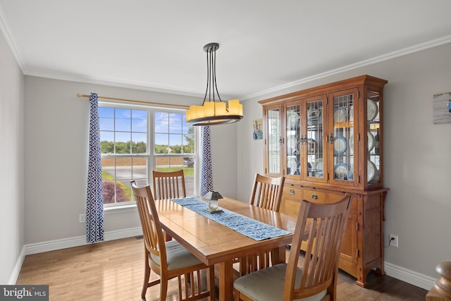 545 Lawrence Corner Rd, Pittsgrove, NJ 08318 - dining room with ornamental molding, wood finished floors, baseboards, and a chandelier