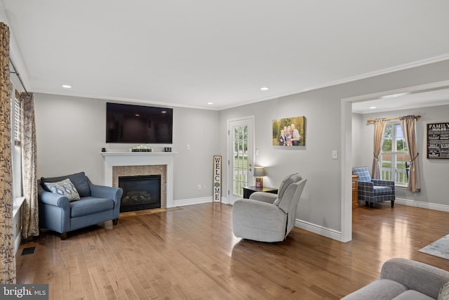 545 Lawrence Corner Rd, Pittsgrove, NJ 08318 - living room with wood finished floors, ornamental molding, baseboards, recessed lighting, and a fireplace with flush hearth