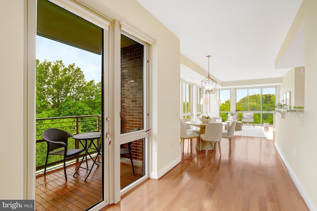 513 W Broad St Unit 602, Falls Church, VA 22046 - sunroom / solarium featuring a chandelier