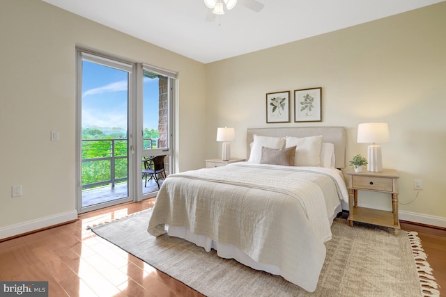 513 W Broad St Unit 602, Falls Church, VA 22046 - bedroom with access to outside, wood finished floors, baseboards, and ceiling fan