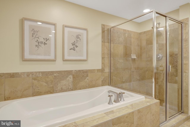 513 W Broad St Unit 602, Falls Church, VA 22046 - bathroom featuring a bath and a stall shower