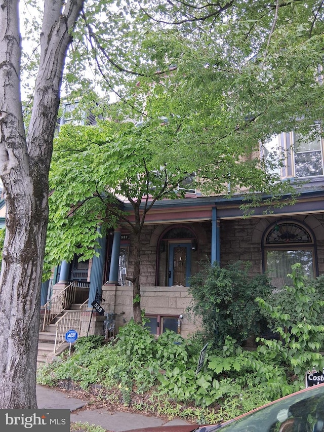 553 Centre Ave, Reading, PA 19601 - view of front of home with covered porch and stone siding