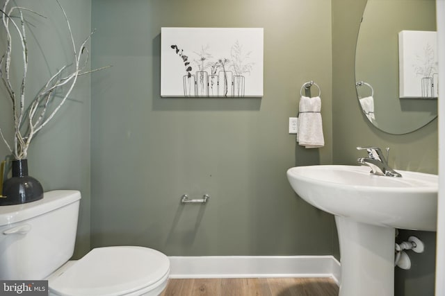 112 Pomo Ln, Winchester, VA 22602 - bathroom with toilet, baseboards, and wood finished floors