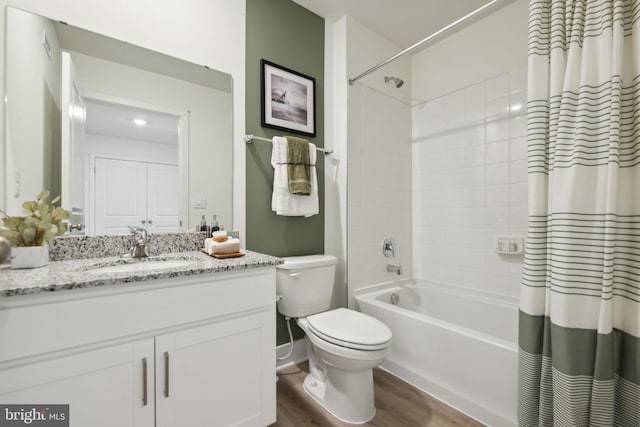 112 Pomo Ln, Winchester, VA 22602 - full bathroom with toilet, wood finished floors, vanity, and shower / bathtub combination with curtain