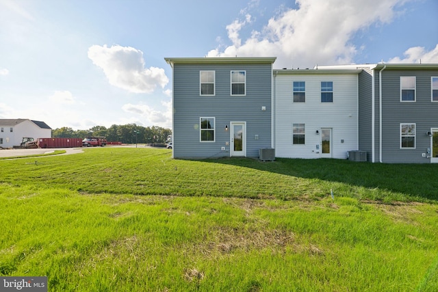 112 Pomo Ln, Winchester, VA 22602 - back of property featuring a lawn and central AC unit