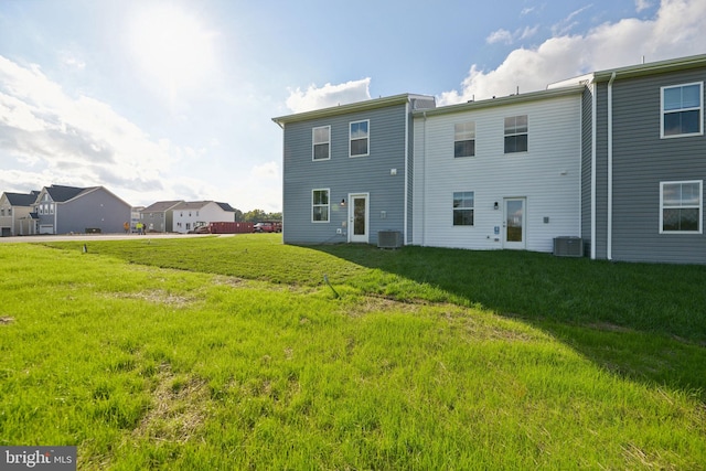 112 Pomo Ln, Winchester, VA 22602 - back of house featuring central AC and a yard